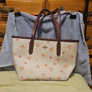Coach White Tote with Brown Trim and Orange Bow Print